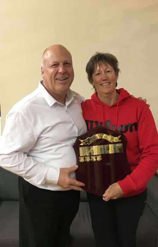 Helen with Denman Tennis Club President Dean Lanyon accepting the Hender Award