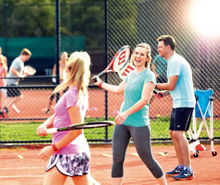two women enjoying cardio tennis. A great way to play social tennis
